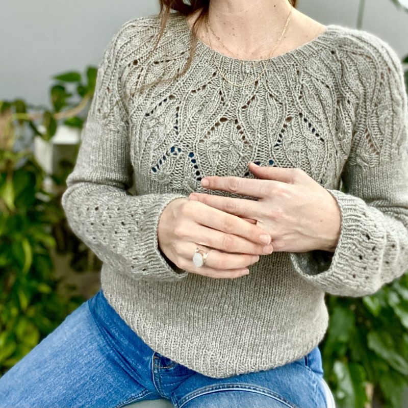 Front of the Plant People Sweater showing the lace and cabled yoke